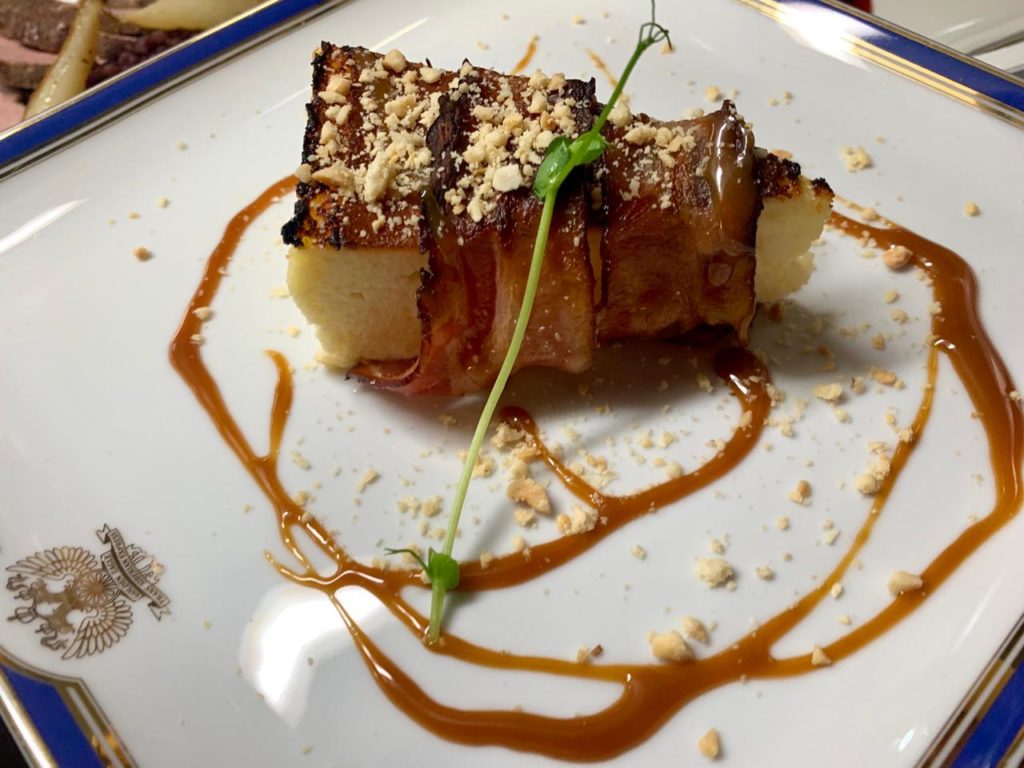 Savoury cheesecake wrapped in bacon