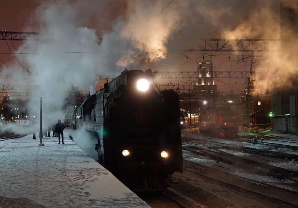 Golden Eagle train at Moscow Kazansky Station, hauled by steam engine.