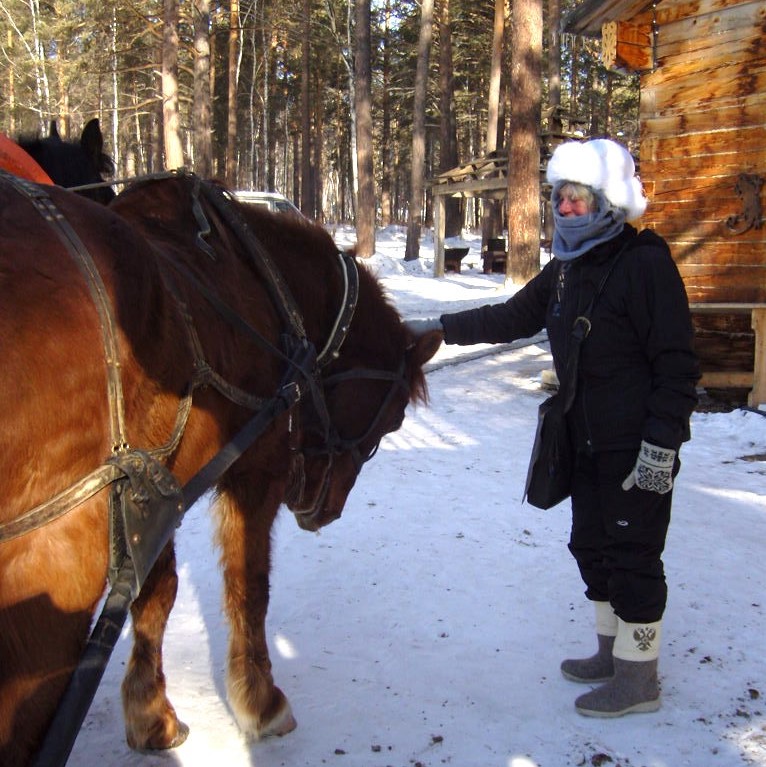 Our Guest Speaker in winter gear with troika horses